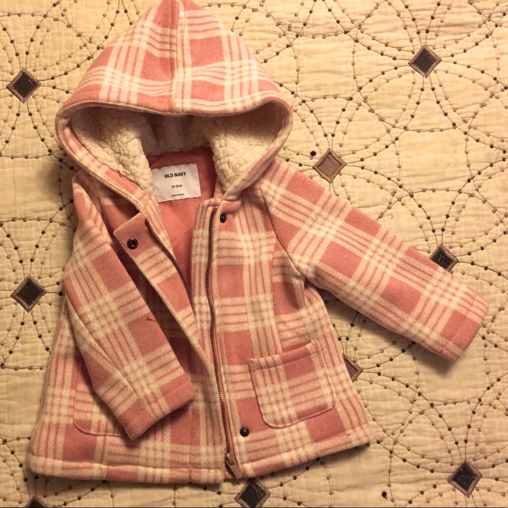 Pink and white plaid coat.